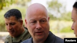 FILE - Jason Greenblatt, center, U.S. President Donald Trump's Middle East envoy, arrives to visit Kibbutz Nahal Oz, just outside the Gaza Strip, in southern Israel, Aug. 30, 2017.