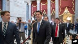 FILE - Then-House Speaker Paul Ryan of Wis., walks out of the House Chamber on Capitol Hill in Washington, May 4, 2017. 