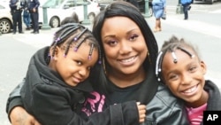 Mone and her daughters are grateful for family and all the trimmings of a happy life.