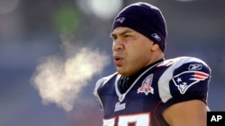 FILE - In this Jan. 10, 2010, photo, NFL linebacker Junior Seau is seen warming up before a game in Foxborough, Mass. Seau, who committed suicide in 2012, was found to have CTE, which has depression among its symptoms.