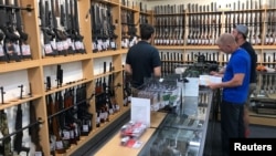 Firearms and accessories are seen on display at Gun City gunshop in Christchurch, New Zealand, March 19, 2019.