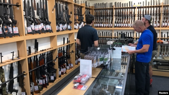 Firearms and accessories are seen on display at Gun City gunshop in Christchurch, New Zealand, March 19, 2019.