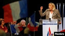 France's far-right National Front political party leader Marine Le Pen delivers a speech during a political rally in Six-Fours, near Toulon, March 16, 2015.