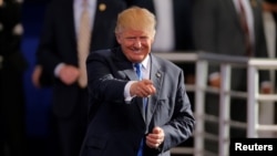 FILE - Then-Republican presidential nominee Donald Trump gestures as he arrives for a campaign rally in Raleigh, North Carolina, Nov. 7, 2016. Terence McNamee, Brenthurst Foundation deputy director in South Africa, says he suspects Africa will be "very low" on Trump's list of presidential priorities.