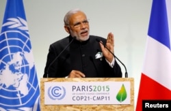 Indian Prime Minister Narendra Modi delivers a speech during the opening session of the World Climate Change Conference 2015 (COP21) at Le Bourget, near Paris, Nov. 30, 2015.