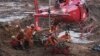 Rescuers Search in Deep Mud After Brazil Dam Breach, 65 Dead