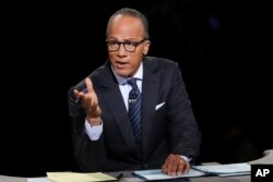 FILE - Moderator Lester Holt, anchor of “NBC Nightly News,” asks a question during the presidential debate at Hofstra University in Hempstead, N.Y., Sept. 26, 2016. Holt says his trip to North Korea was valuable despite restrictions placed upon him by his hosts.
