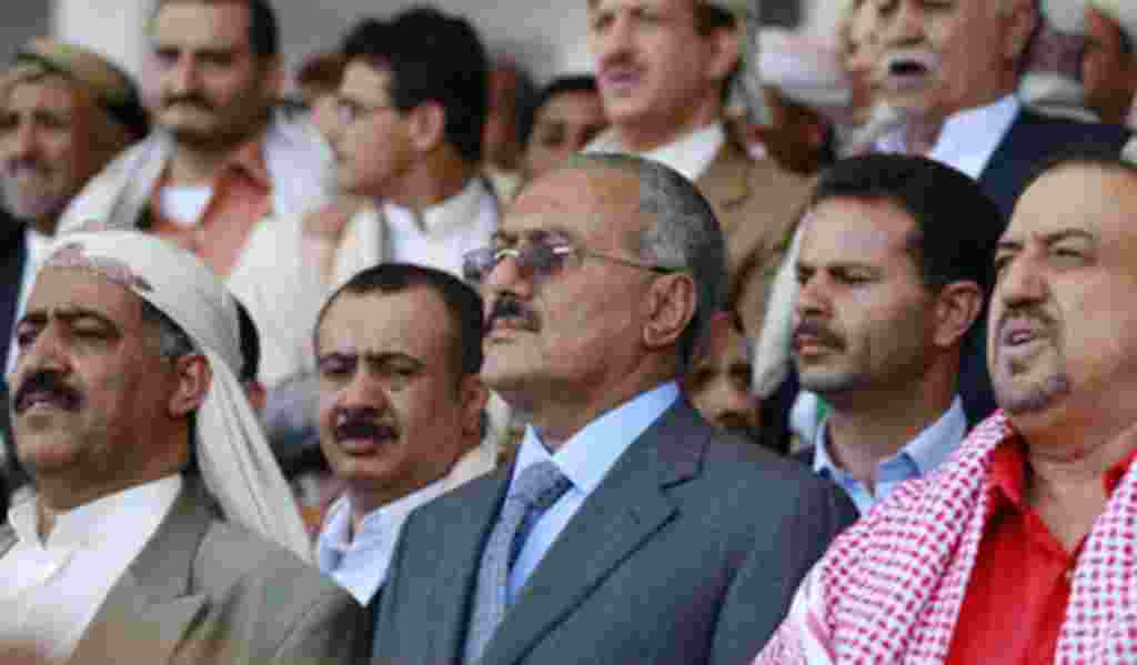 Yemen's President Ali Abdullah Saleh (C) attends a rally held by pro-government supporters in Sanaa, May 13, 2011