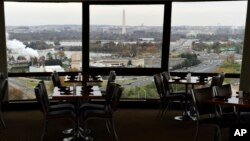 This Friday, Nov. 9, 2018, photo shows a view of Washington from a revolving restaurant in Crystal City, Va.