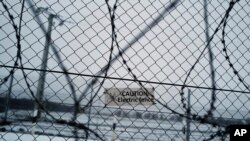 Hungary's border fence with Serbia is seen outside the village of Gyala, Serbia, Jan. 13, 2022.