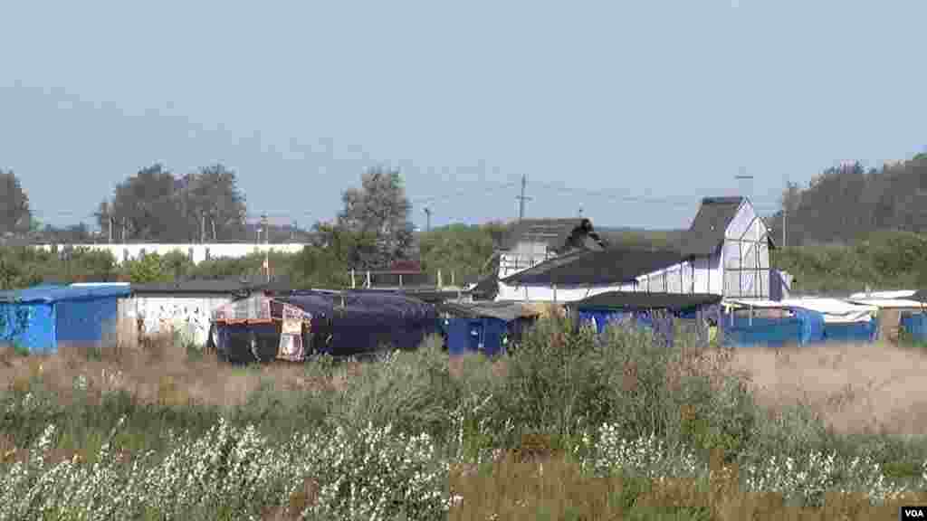 The 'Jungle' migrant camp, seen here, is due to be completely demolished by year's end, in Calais, France. (L. Bryant/VOA)