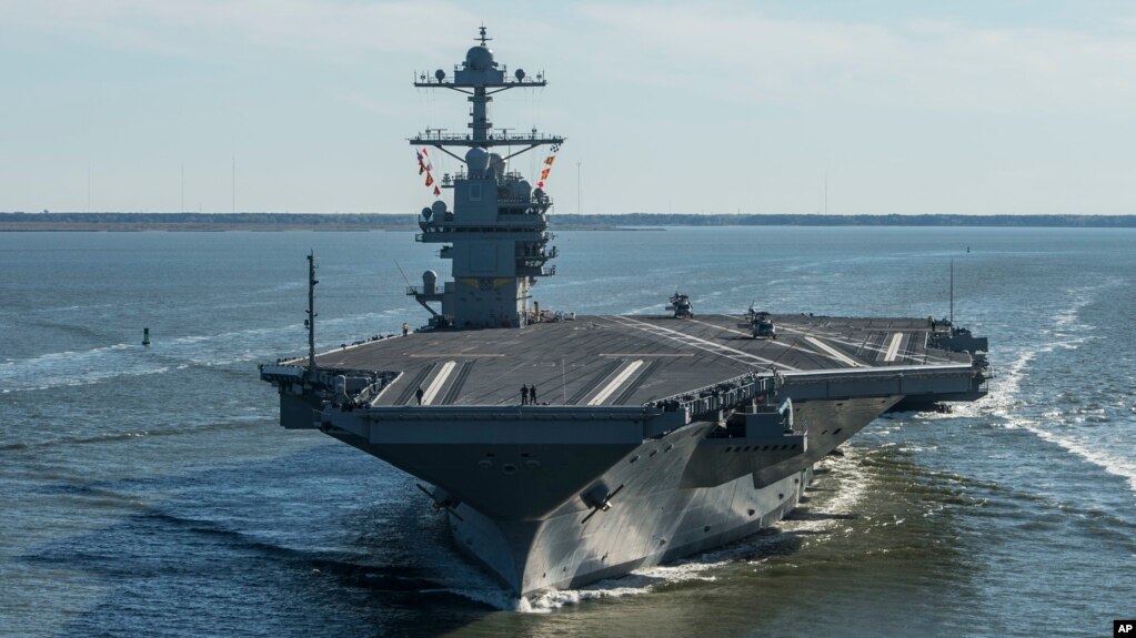 FILE - The USS Gerald R. Ford embarks on the first of its sea trials to test various state-of-the-art systems on its own power for the first time, from Newport News, Virginia, in an undated photo provided by the U.S. Navy.