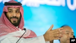 FILE - Saudi Crown Prince Mohammed bin Salman speaks at the opening ceremony of Future Investment Initiative Conference in Riyadh, Saudi Arabia, Oct. 24, 2107. Saudi Arabia's crown prince has promised to return the ultraconservative kingdom to a more "moderate" Islam. 