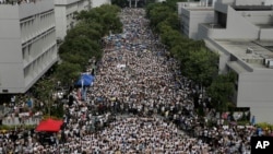 Students demonstrate at the Chinese University of Hong Kong campus in Hong Kong, Sept. 22, 2014. 