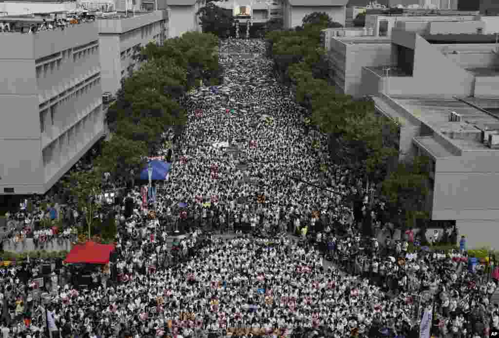 Students rally at the Chinese University of Hong Kong campus in Hong Kong. Thousands of students boycotted classes to protest Beijing&rsquo;s decision to restrict electoral reforms. The weeklong strike is the latest phase in the fight for democracy in Hong Kong. 