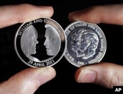 The official coin, left, commemorating the wedding of Prince William to Kate Middleton. It is next to the wedding coin of the Prince of Wales and Lady Diana Spencer.