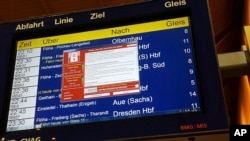 A display panel with an error can be seen at the main railway station in Chemnitz, Germany, May 12, 2017. Deutsche Bahn said early Saturday that departure and arrival display screens at its stations were hit Friday night by the attack.