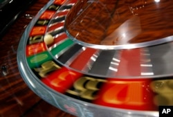 A roulette is displayed at the Global Gaming Expo Asia in Macau, June 8, 2011.