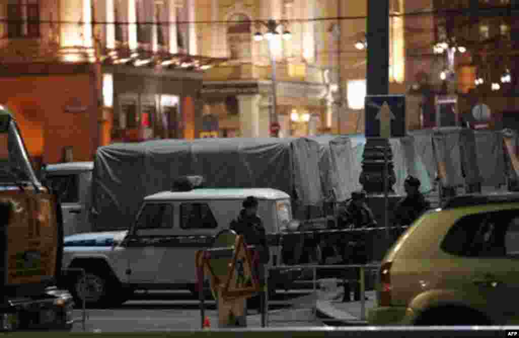 Russian police troops vehicles stand outside Red Square in Moscow, Thursday, Dec. 8, 2011. Moscow has already put about 50,000 police and 2,000 paramilitary troops on the streets, backed by water cannon. Prime Minister Vladimir Putin warned that the gover