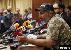 Armenian opposition leader Nikol Pashinyan speaks during a news conference in Yerevan, Armenia, April 24, 2018.