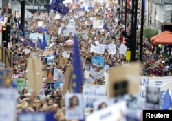 People hold banners during a "March for Europe" demonstration against Britain's decision to leave the European Union, in central London, Britain, July 2, 2016. Britain voted to leave the European Union in the EU Brexit referendum.