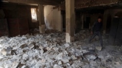 The remains of burned ancient books and manuscripts are seen inside Mosul's heavily damaged museum, March 8, 2017.