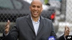 U.S. Sen. Cory Booker, D-NJ, speaks during a news conference outside of his home, Feb. 1, 2019, in Newark, N.J.