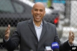 U.S. Sen. Cory Booker, D-NJ, speaks during a news conference outside of his home, Feb. 1, 2019, in Newark, N.J.