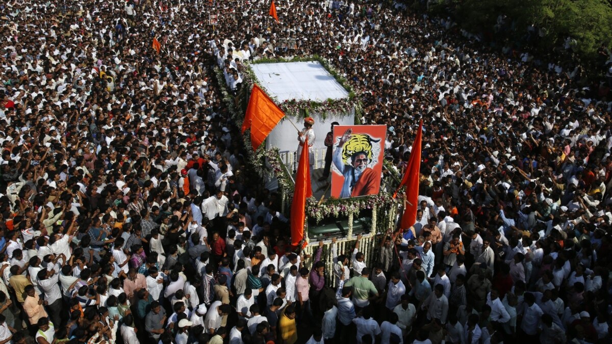 Crowd around. Funeral Procession. Hindu nationalist.