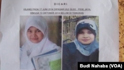 Berita tentang hilangnya santri perempuan Aceh bernama RS (17), diumumkan melalui selebaran yang diedarkan di sekitar wilayah tersebut (Foto: VOA/Budi Nahaba)