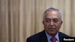 FILE - Then-Palestinian Prime Minister Salam Fayyad attends an opening reception of Conference on Cooperation among East Asian Countries for Palestinian Development in Tokyo.