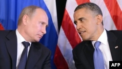 U.S. President Barack Obama (R) listens to Russian President Vladimir Putin after their bilateral meeting in Los Cabos, Mexico on June 18, 2012, on the sidelines of the G20 summit.