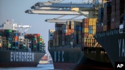 FILE - Container ships are seen at the Port of Savannah, Georgia, Sept. 29, 2021. 