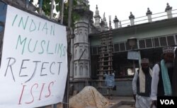 FILE - Anti-Islamic State posters are seen around a mosque in Kolkata, India, Dec. 5, 2015. Muslims in India have condemned Islamic State as an un-Islamic group. (S. Azizur Rahman/VOA)