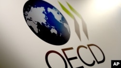 នេះ​ជា​ស្លាកសញ្ញា​របស់អង្គការ​សម្រាប់ កិច្ចសហ​ប្រតិបត្តិការ​សេដ្ឋកិច្ច​និង​ការ​អភិវឌ្ឍ ​OECD។