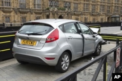 This handout photo released by the Metropolitan Police on Aug. 15, 2018, shows the silver Ford Fiesta after it crashed outside the Houses of Parliament in a suspected terror attack on Aug. 14.