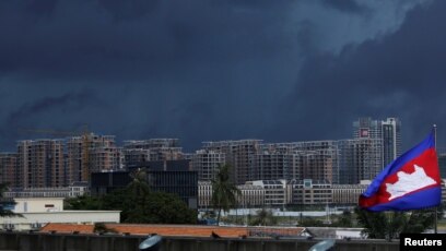 FILE: Buildings under construction are pictured beneath dark clouds in Phnom Penh, Cambodia, June 18, 2018.