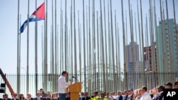 Cuban-American Poet Richard Blanco reads a poem during the reopening ceremony of the U.S. embassy in Havana, Cuba, Aug. 14, 2015. 