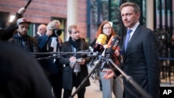 Chairman of the Germany's Free Democratic Party, Christian Lindner speaks to reporters in Berlin, Nov. 21, 2017. On Sunday Linder said Germany should be able to deport unaccompanied young refugees involved in crimes.
