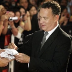 Tom Hanks signs autographs at the SIngapore premiere of "Larry Crowne"