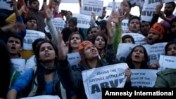 Members of Indian students organization ABVP shout slogans as they protest the release of a juvenile convicted in the fatal 2012 gang rape that shook the country in New Delhi, India, Dec.20, 2015. 