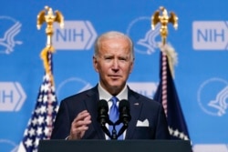 FILE - President Joe Biden speaks about the COVID-19 variant named omicron during a visit to the National Institutes of Health on Dec. 2, 2021, in Bethesda, Md