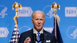 FILE - President Joe Biden speaks about the COVID-19 variant named omicron during a visit to the National Institutes of Health on Dec. 2, 2021, in Bethesda, Md