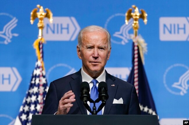 FILE - President Joe Biden speaks about the COVID-19 variant named omicron during a visit to the National Institutes of Health on Dec. 2, 2021, in Bethesda, Md