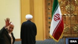 حسن روحانی رئیس جمهوری ایران پس از نشست خبری بعد از آغاز برجام. 