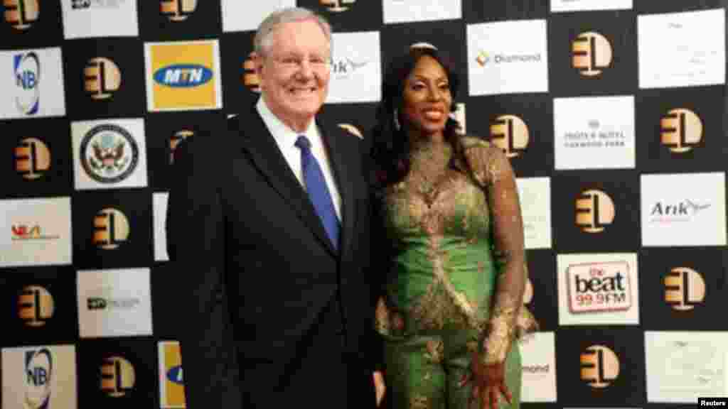 Steve Forbes, Editor-in-Chief of Forbes Media, left, and Mo Abudu, chief executive officer of EbonyLife TV pose for photographers during the launch of Africa’s first global black entertainment network, Sunday June 30, 2013.