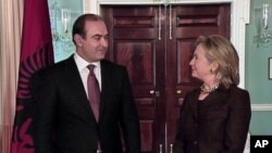 U.S. Secretary of State Hillary Clinton and Albanian Foreign Minister Edmond Haxhinasto