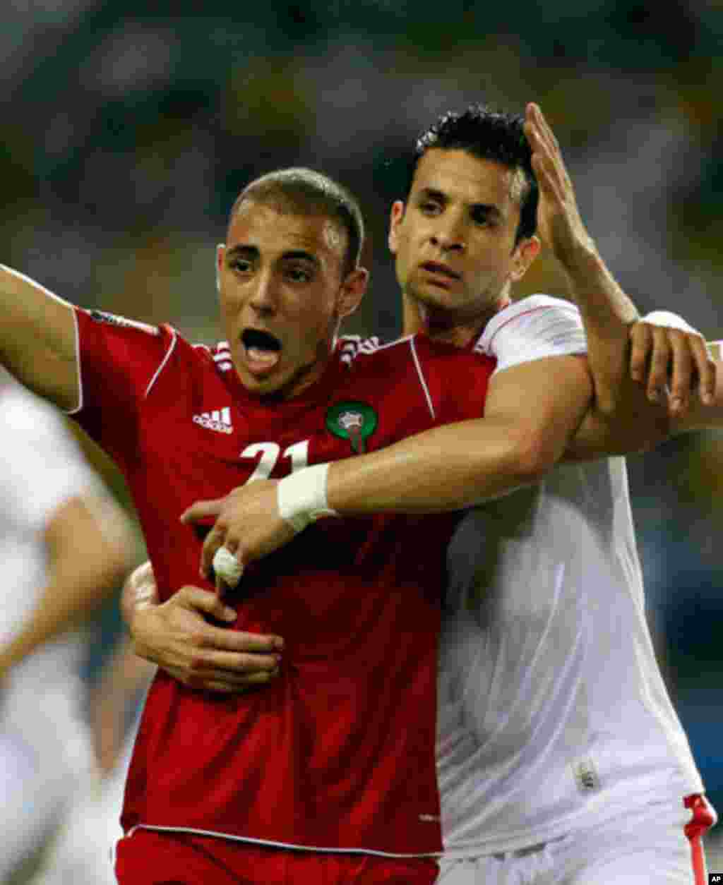 Morocco's Aissam appeals to the referee during their African Cup of Nations soccer match against Tunisia in Libreville