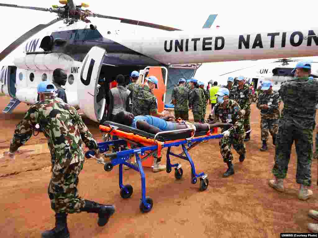 The UN Mission in South Sudan helps to medevac people who were wounded in clashes in Jonglei state, from Manyabol to Bor, the state capital, on July 14. 