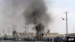 아프가니스탄 남부 헬만드 주의 테러 현장에서 연기가 치솟고 있다. (자료사진)